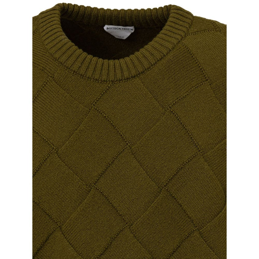 Green Wool SweatshirtBottega Veneta Wool Blend Intreccio Sweater. Crewneck, iconic 3D allover woven motif. Regular fit. Composition: 95% wool, 4% polyamide, 1% elastane Internal SKU: 25MAR54 Brand SKU: 751972V36YO 095Green Wool Sweatshirt${tagsBottega Ven