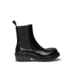 Black Leather Chelsea BootsBottega Veneta Brushed Leather Fireman Boot Versatile and practical, Bottega Veneta’s Fireman Chelsea boots are a modern wardrobe staple. Crafted from brushed black leather, they feature elastic inserts and a rubber sole. Sole: