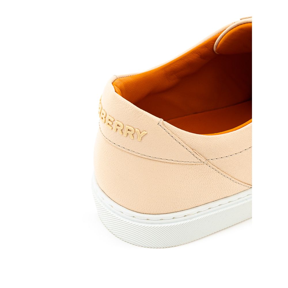 Pink Leather Low Top SneakersBurberry Powder Leather Sneaker. Tone-on-tone lace-up front, round toe, tone-on-tone topstitching, white rubber sole. Embossed tone-on-tone logo on back. Composition: 100% Leather-Sku inside:24GIU91Pink Leather Low Top Sneaker