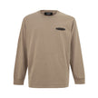 Beige Cotton T-ShirtLong-sleeved T-Shirt with Dsquared2 logo. In beige cotton, crew neck, long sleeves contrasting black rubber logo on the side, maxi front pocket, slits on the sides, over fit. Composition: 100% Cotton-Sku inside:24MG03Beige Cotton T-Shi
