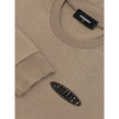 Beige Cotton T-ShirtLong-sleeved T-Shirt with Dsquared2 logo. In beige cotton, crew neck, long sleeves contrasting black rubber logo on the side, maxi front pocket, slits on the sides, over fit. Composition: 100% Cotton-Sku inside:24MG03Beige Cotton T-Shi