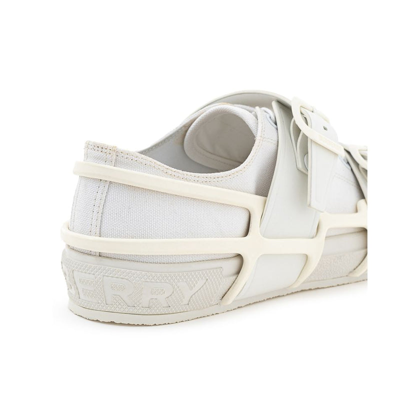 White Cotton Athletic SneakersBurberry White Canvas Sneaker with External Rubber Structure. Front fastening with tone-on-tone laces, round toe with white shiny rubber detail, engraved logo on the back. The shoe is covered with a white rubber/plastic struc