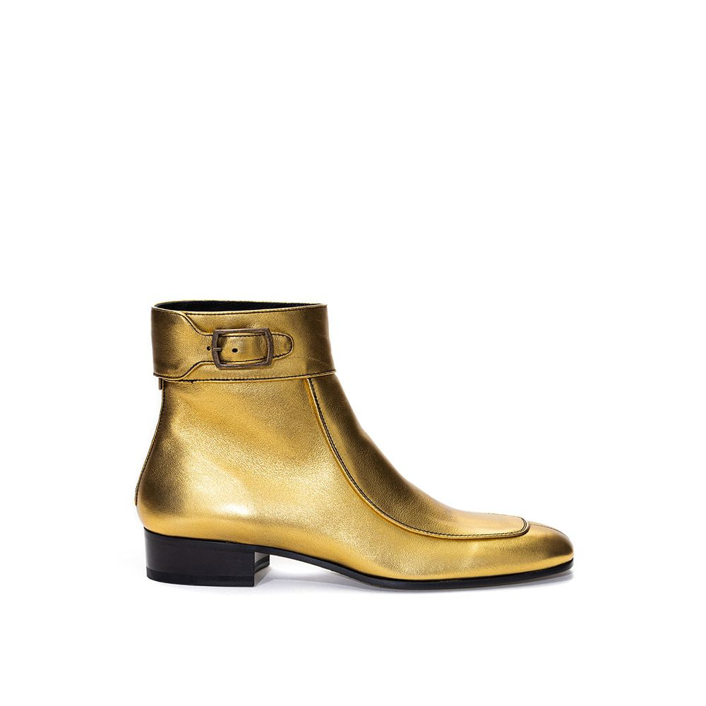 Gold Leather Ankle BootsGold Leather Ankle Boot Saint Laurent. Made of gold-colored leather, square toe, visible stitching, strap with buckle above the ankle, rear zipper, black leather outsole. Heel height: 3 cm. Composition: 100% Leather. Internal SKU: