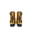 Gold Leather Ankle BootsGold Leather Ankle Boot Saint Laurent. Made of gold-colored leather, square toe, visible stitching, strap with buckle above the ankle, rear zipper, black leather outsole. Heel height: 3 cm. Composition: 100% Leather. Internal SKU: