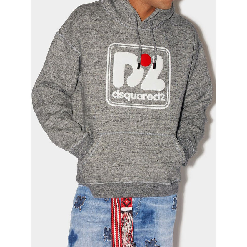 Gray Cotton SweatshirtDsquared2 Hercalina Over Fit Sweatshirt. In gray mélange with plush interior, adjustable hood, maxi front pocket. On front embossed rubberized logo in white. Consider the over fit of this product when purchasing. Composition: 100% Co