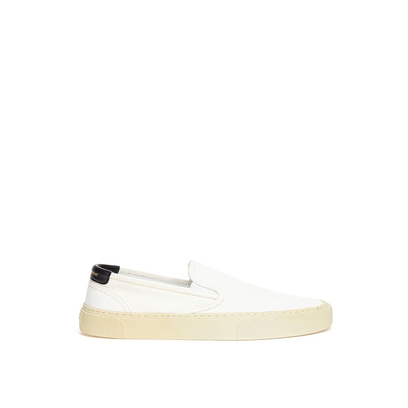 White Cotton Low Top SneakersWhite Canvas Slip-On Saint Laurent. Venice slip-on in cotton canvas, tone-on-tone rubber sole, round toe, black leather back tab with logo. Printed logo on the back. Sole height: 3 cm. Composition: 100% Cotton, leather interio