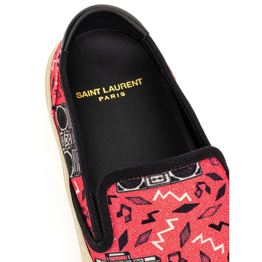 Pink Cotton Platform SneakersPink Canvas Slip-On with Radio Print Saint Laurent. Venice slip-on in pink cotton canvas with allover print, white rubber sole, round toe, black leather back tab with logo. Printed logo on the back of the sole. Sole height: 3