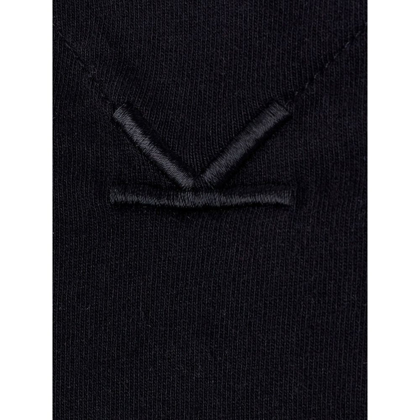 Elegant Cotton Tee in Timeless BlackIndulge in the epitome of casual luxury with our Kenzo black cotton T-shirt. Designed for the discerning gentleman, this tee combines comfort with elegance, making it a versatile addition to any wardrobe. Perfect for a