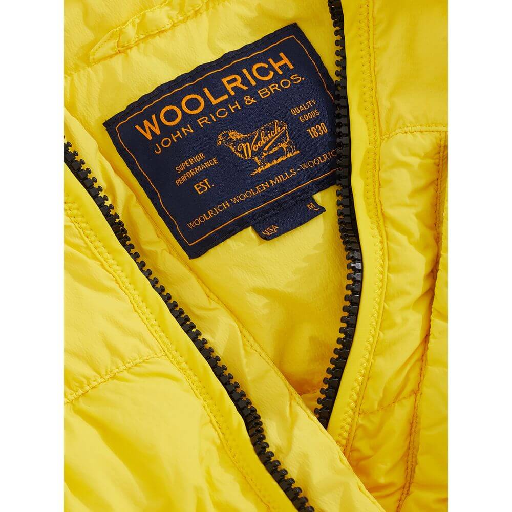 Mens Vibrant Yellow Outdoor JacketEmbrace the great outdoors with this striking Yellow Jacket by Woolrich, designed to add a pop of color and style to any adventurous wardrobe. Perfect for those who don’t compromise on style while seeking functionality, t