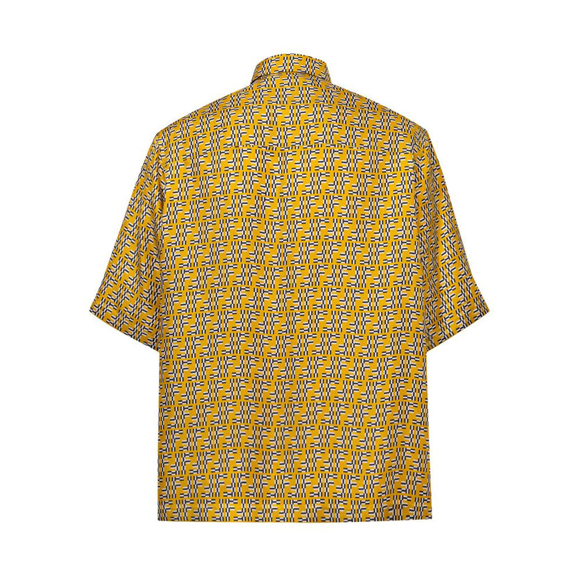 Yellow Silk Shortsleeve ShirtHita Yellow Silk Shirt with Fendi Labyrinth Print. Made of yellow silk with FF Labyrinth allover print, classic collar, short sleeves, front fastening with covered buttons, over fit, boxy fit pattern. Composition: 100% Silk In