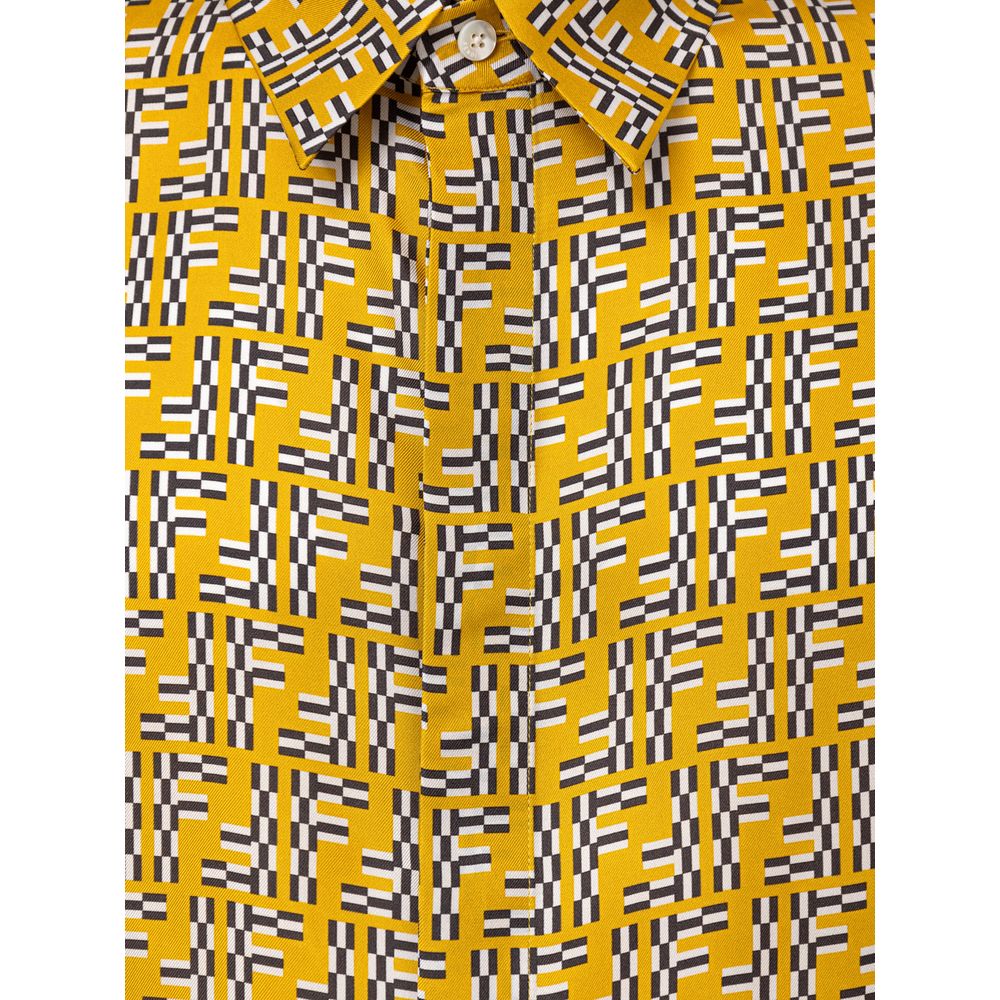 Yellow Silk Shortsleeve ShirtHita Yellow Silk Shirt with Fendi Labyrinth Print. Made of yellow silk with FF Labyrinth allover print, classic collar, short sleeves, front fastening with covered buttons, over fit, boxy fit pattern. Composition: 100% Silk In