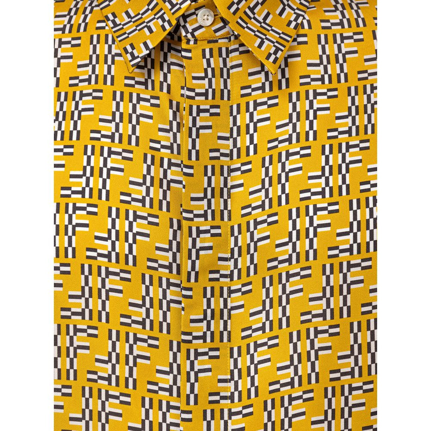 Yellow Silk Shortsleeve ShirtHita Yellow Silk Shirt with Fendi Labyrinth Print. Made of yellow silk with FF Labyrinth allover print, classic collar, short sleeves, front fastening with covered buttons, over fit, boxy fit pattern. Composition: 100% Silk In