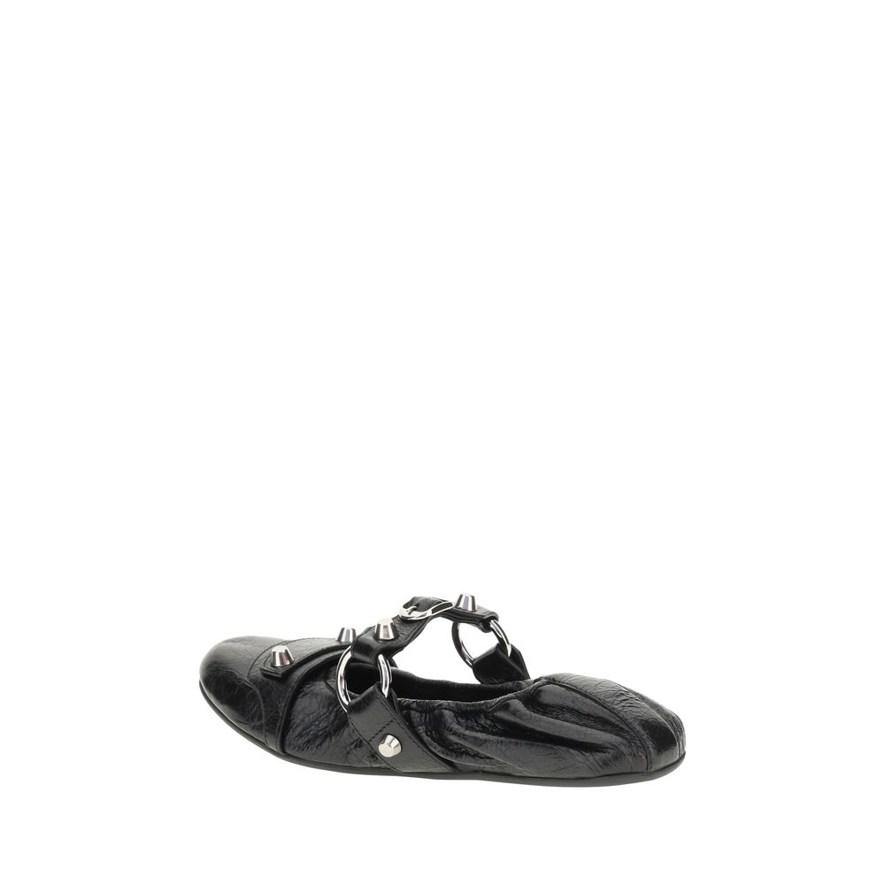 Black Calf Leather Bos Taurus Ballet FlatsBalenciaga’s City Ballerinas are a mix of elegance and boldness, crafted in Arena lambskin leather for a touch of luxury. The rounded toe and silver ABS buckle studs add character and originality. The tone-on-tone