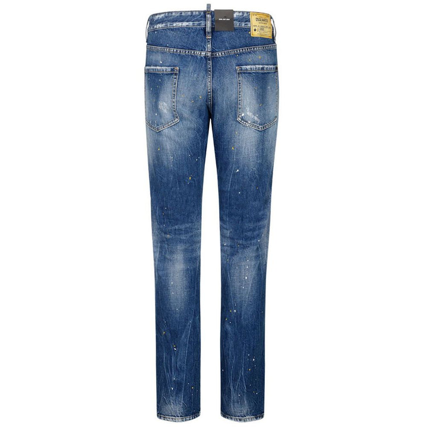 Blue Cotton Men's Slim-Fit JeanElevate your denim game with Dsquared²’s expertly crafted slim fit jeans. These striking blue cotton jeans boast a unique edge with bold dark denim patches, artful tears, and dynamic paint splash details. Designed for those