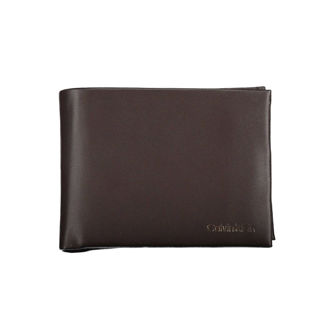 Elegant Leather Dual-Compartment WalletRefinement and functionality fuse in this exquisite Calvin Klein wallet, crafted from premium leather. Equipped with two compartments, this wallet offers ample space for currency and essential cards. A coin purse add