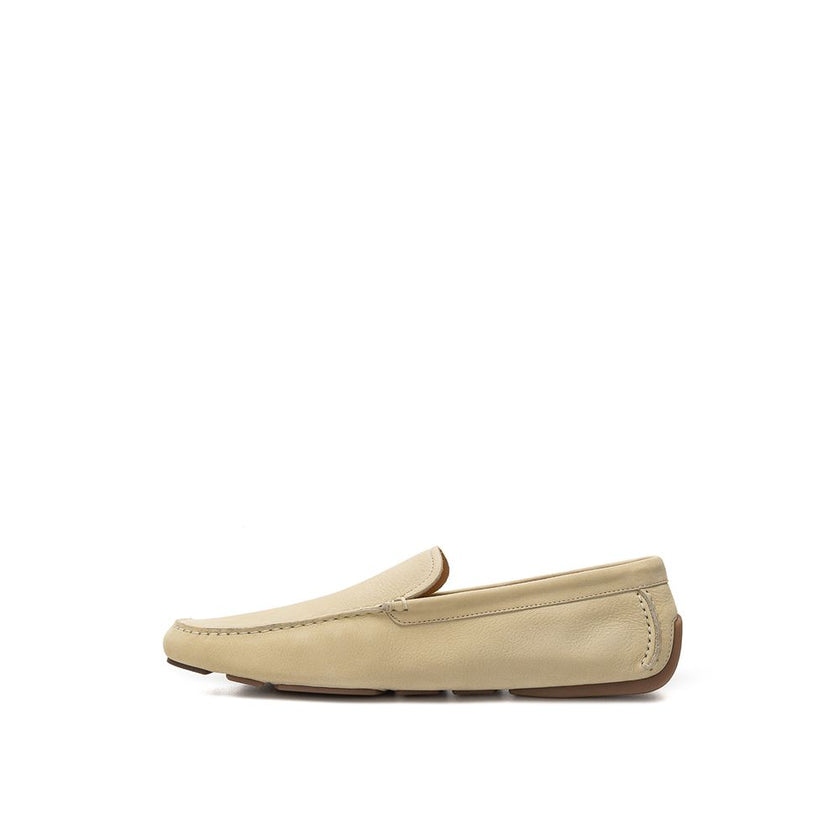 Beige Leather MoccassinBally beige suede leather loafer. Round toe, tone-on-tone topstitching, rubber sole, rubber insert on back with engraved logo. Non-slip rubber band outsole. Composition:100% Leather-Sku inside:24GEN54Beige Leather Moccassin${tagsBal