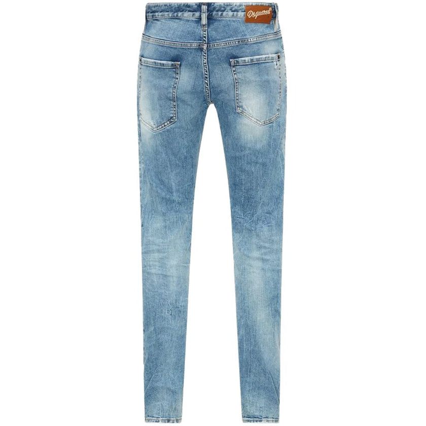 Blue Cotton Men's Slim Fit JeanElevate your denim game with Dsquared²’s impeccably tailored slim-fit jeans. Exuding a rebellious charm with artful tears and a weathered light blue wash, these jeans promise to be the centerpiece of any outfit. Accented wit