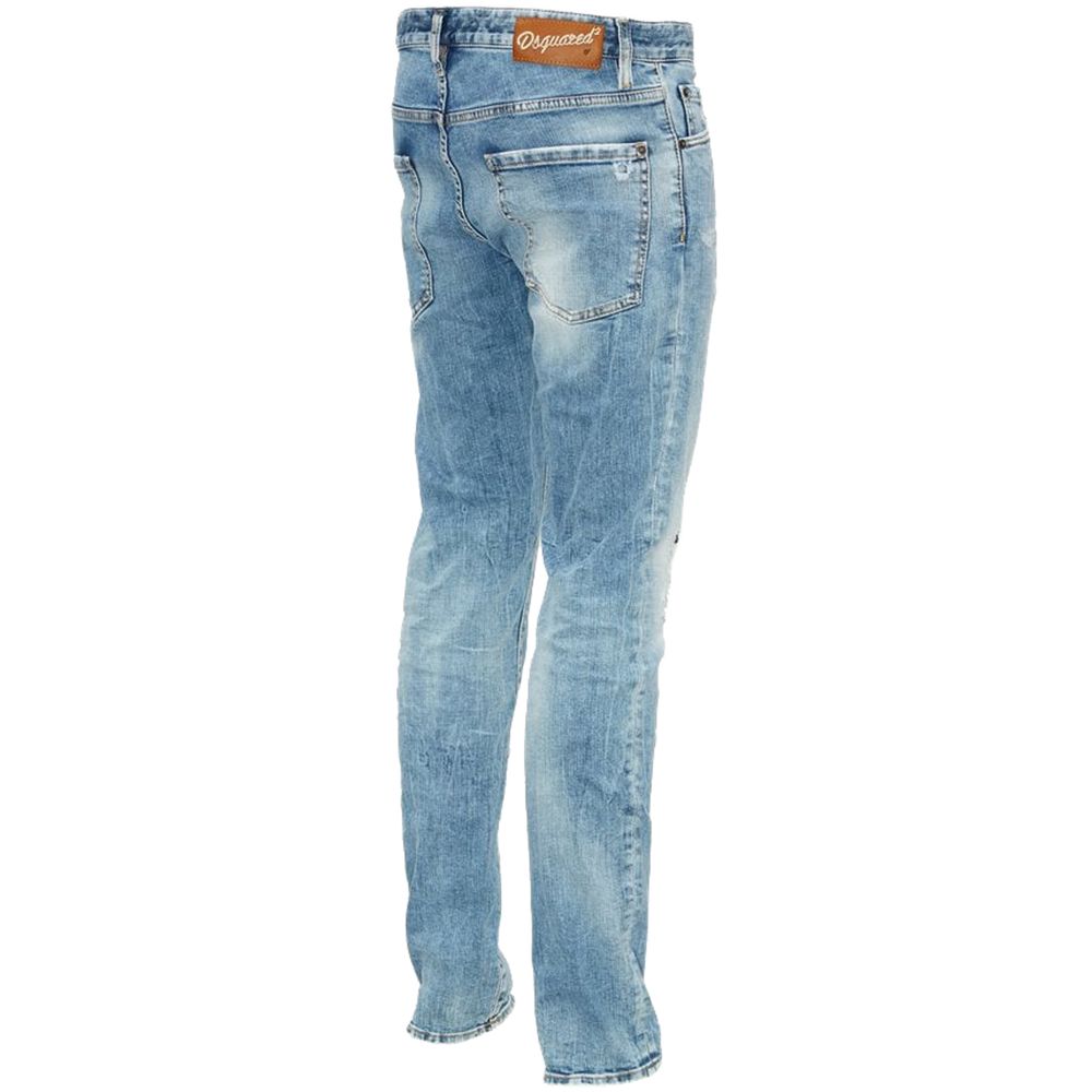 Blue Cotton Men's Slim Fit JeanElevate your denim game with Dsquared²’s impeccably tailored slim-fit jeans. Exuding a rebellious charm with artful tears and a weathered light blue wash, these jeans promise to be the centerpiece of any outfit. Accented wit