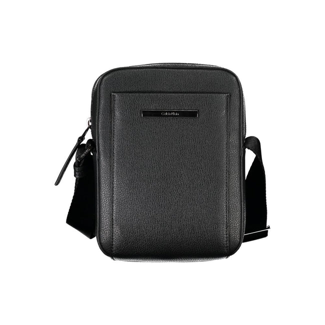 Sleek Black Shoulder Bag with Logo DetailExperience the perfect blend of functionality and style with this sleek black shoulder bag from the renowned Calvin Klein. Designed for the modern individual, it boasts an adjustable shoulder strap for customized c