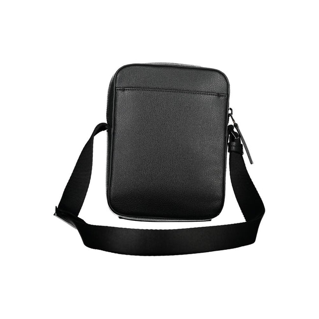 Sleek Black Shoulder Bag with Logo DetailExperience the perfect blend of functionality and style with this sleek black shoulder bag from the renowned Calvin Klein. Designed for the modern individual, it boasts an adjustable shoulder strap for customized c