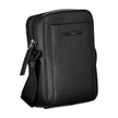 Sleek Black Shoulder Bag with Logo DetailExperience the perfect blend of functionality and style with this sleek black shoulder bag from the renowned Calvin Klein. Designed for the modern individual, it boasts an adjustable shoulder strap for customized c