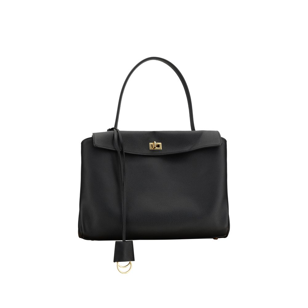 Black Calf Leather Bos Taurus Shoulder BagBalenciaga’s Rodeo Leather Shoulder Bag features a top handle for a comfortable and stylish grip. The front closure features a flap and swivel, adding a distinctive and functional detail. Applied keychain detail o