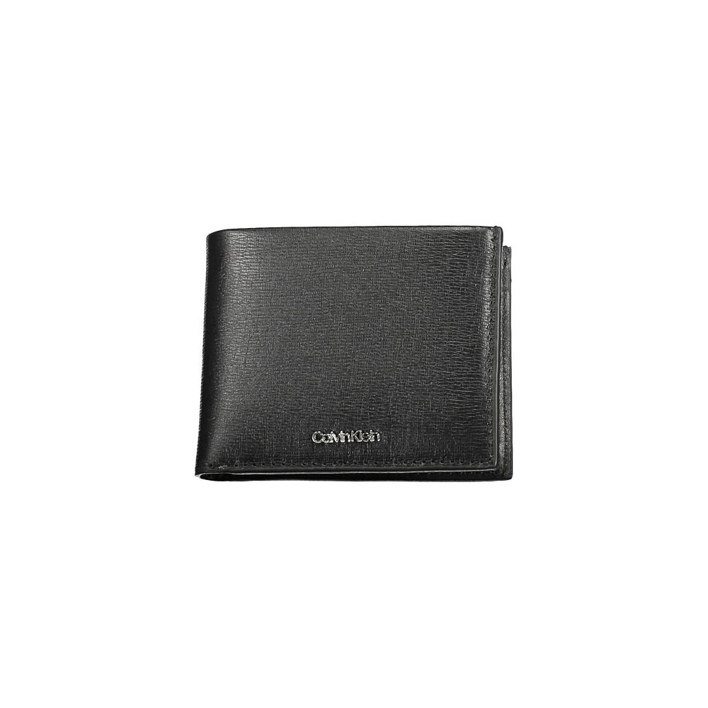 Black Polyester Men WalletEmbrace the epitome of sophistication with the sleek Calvin Klein wallet. A perfect blend of functionality and style, this accessory features two compartments, a convenient coin purse, and ample card slots to keep you organized o