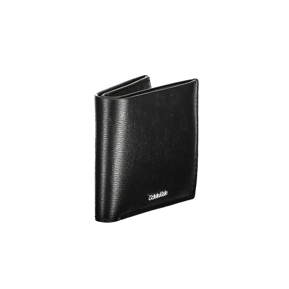 Black Polyester Men WalletEmbrace the epitome of sophistication with the sleek Calvin Klein wallet. A perfect blend of functionality and style, this accessory features two compartments, a convenient coin purse, and ample card slots to keep you organized o