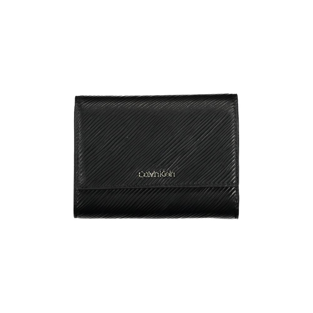 Black Polyethylene Women WalletElevate your everyday elegance with this sleek Calvin Klein wallet, designed for the fashion-forward individual. Its streamlined silhouette is complemented by contrasting details that add a dash of bold flair. Keep your esse