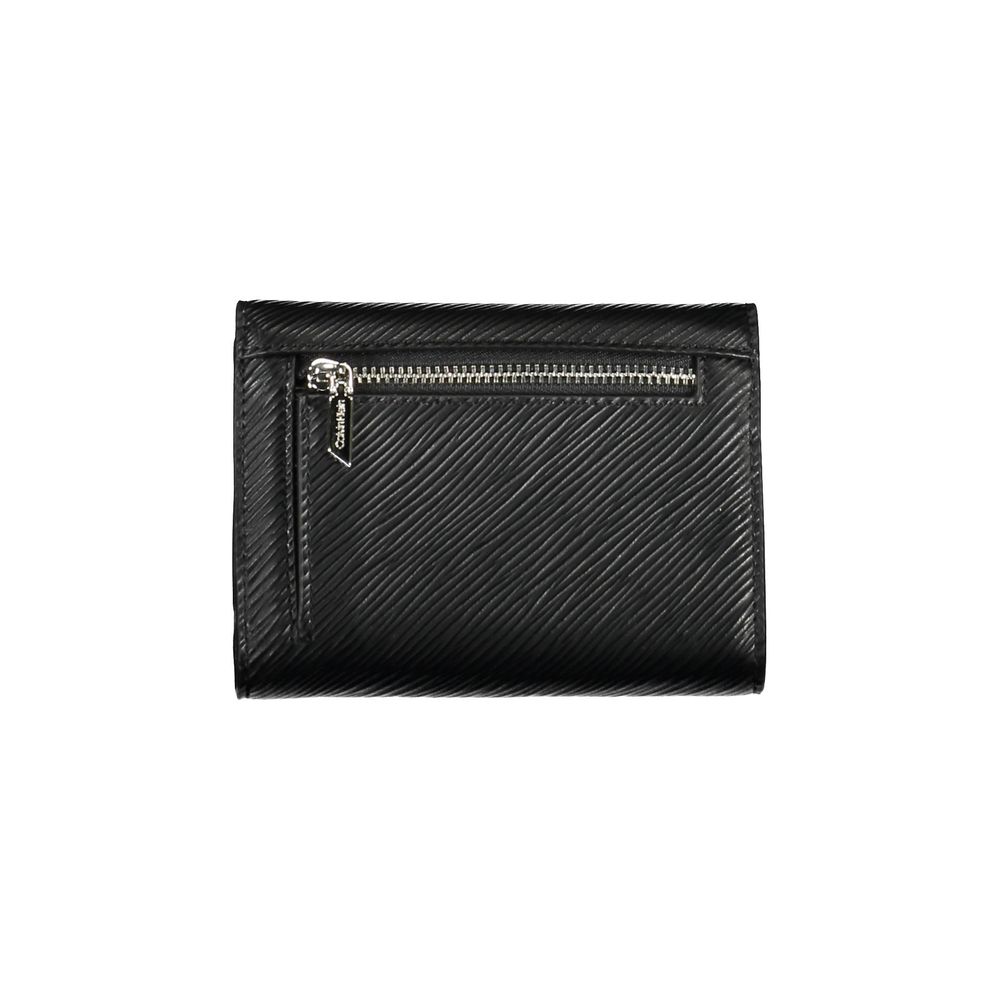 Black Polyethylene Women WalletElevate your everyday elegance with this sleek Calvin Klein wallet, designed for the fashion-forward individual. Its streamlined silhouette is complemented by contrasting details that add a dash of bold flair. Keep your esse