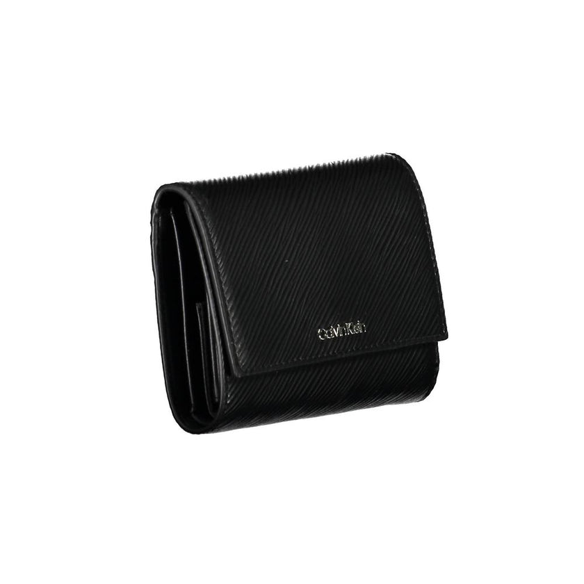 Black Polyethylene Women WalletElevate your everyday elegance with this sleek Calvin Klein wallet, designed for the fashion-forward individual. Its streamlined silhouette is complemented by contrasting details that add a dash of bold flair. Keep your esse