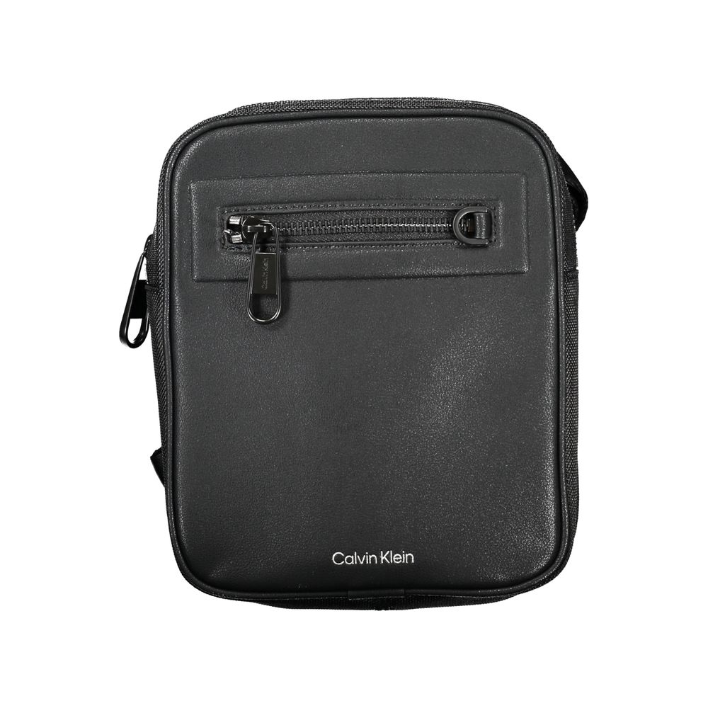 Sleek Black Shoulder Bag with Contrasting DetailsElevate your style and organize your essentials with this versatile Calvin Klein shoulder bag. Perfect for the eco-conscious fashion enthusiast, this piece not only adds a touch of class but also supports s