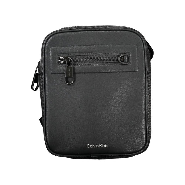 Sleek Black Shoulder Bag with Contrasting DetailsElevate your style and organize your essentials with this versatile Calvin Klein shoulder bag. Perfect for the eco-conscious fashion enthusiast, this piece not only adds a touch of class but also supports s