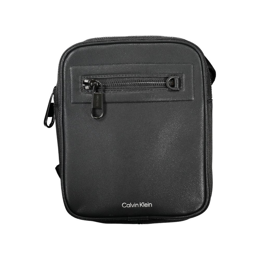 Sleek Black Shoulder Bag with Contrasting DetailsElevate your style and organize your essentials with this versatile Calvin Klein shoulder bag. Perfect for the eco-conscious fashion enthusiast, this piece not only adds a touch of class but also supports s