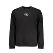 Black Cotton Men SweaterStep out in confidently cool style with this sleek Calvin Klein long sleeve sweatshirt. Perfectly balancing sustainability and fashion-forward design, it’s crafted with an eco-conscious blend that includes 20% recycled cotton. The