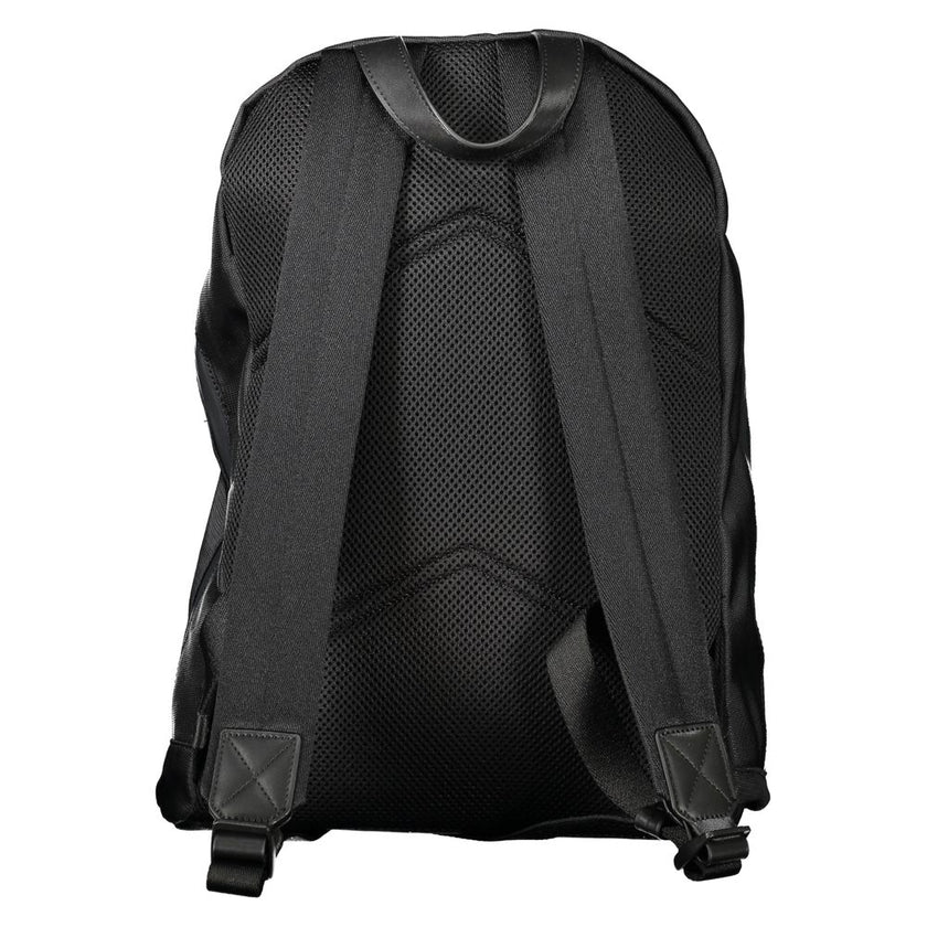 Black Polyester Men BackpackElevate your on-the-go gear with the Calvin Klein Backpack, designed to blend high fashion with practicality. A sleek black palette defines this accessory, underscored by an unmistakable logo, making it a stand-out piece. Craft