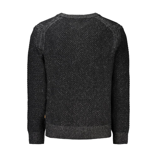 Black Wool Men SweaterElevate your wardrobe with the signature sophistication of Hugo Boss. This sleek long sleeve sweater features a classic V-neck cut, enhanced with eye-catching contrast details. The iconic logo subtly adorns the design, making it a pe