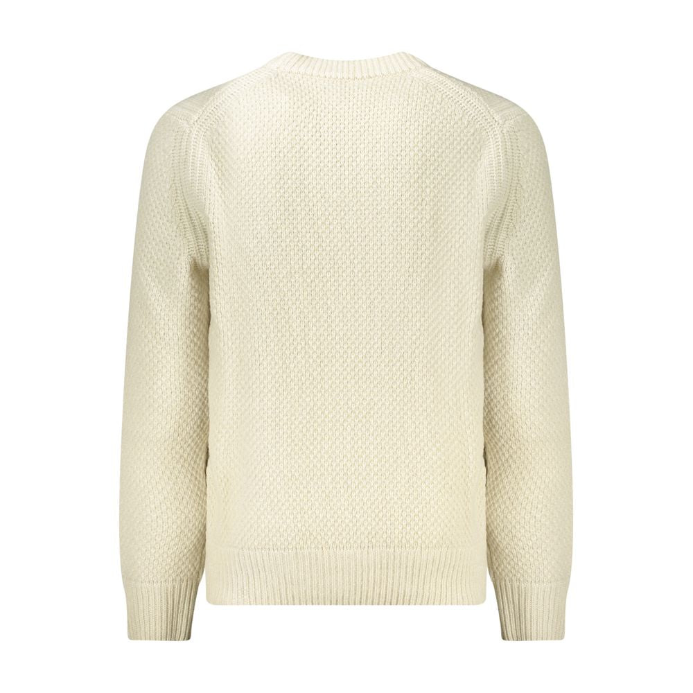 Beige Wool Men SweaterSet the tone of your day with the unmistakable sophistication of Hugo Boss. This long sleeve sweater features a classic V-neck cut, elegantly highlighted by contrasting details that pronounce a modern edge. The iconic Hugo Boss logo