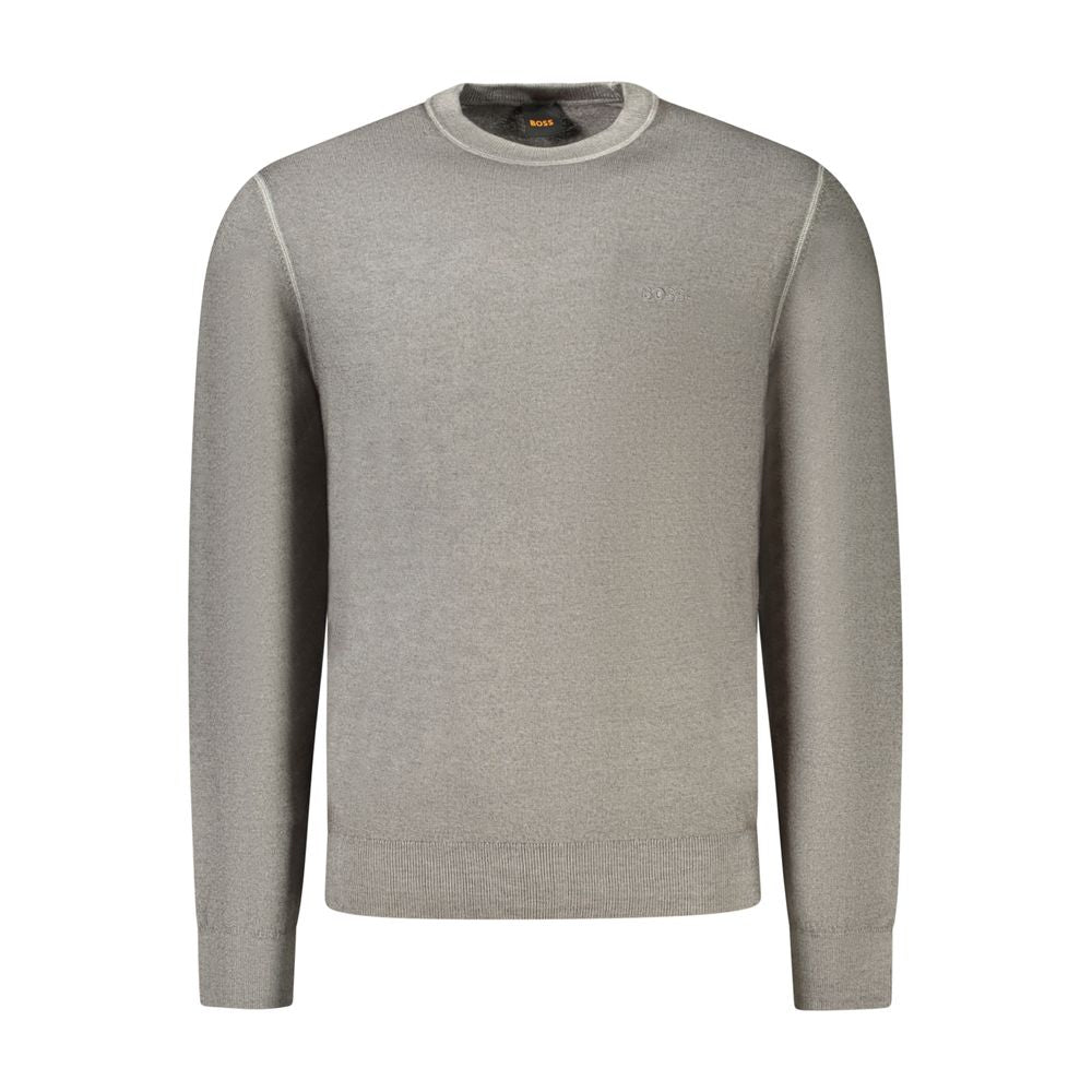 Gray Wool Mens SweaterElevate your style with the ‘Hugo Boss’ long-sleeved T-shirt, a true mark of sophistication and class. This sleek, crew neck top is adorned with exquisite embroidery and the iconic ‘Hugo Boss’ logo, adding a touch of luxury to your e