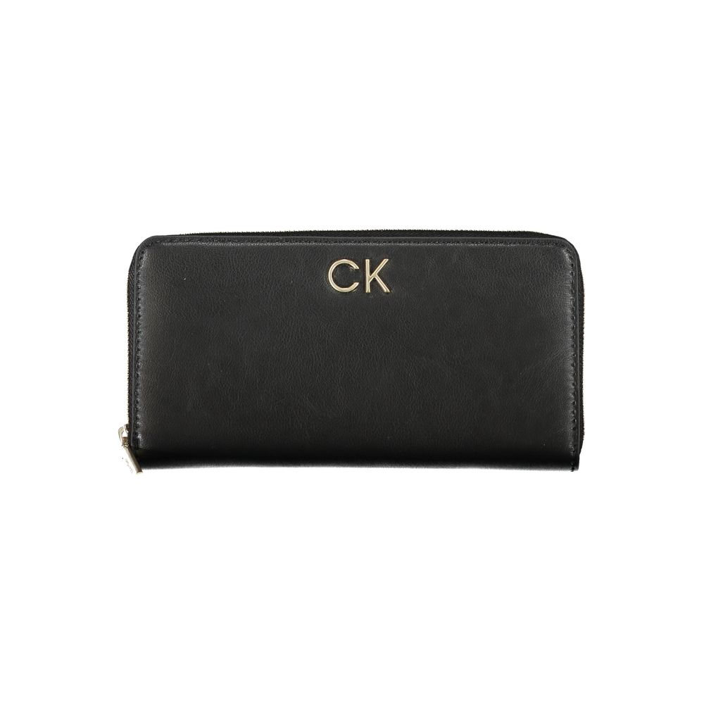 Elegant Multi-Compartment Designer WalletExperience the blend of functionality and sleek design with this sophisticated wallet from Calvin Klein. Designed for the modern individual, it offers five compartments, a convenient coin purse, and dedicated card