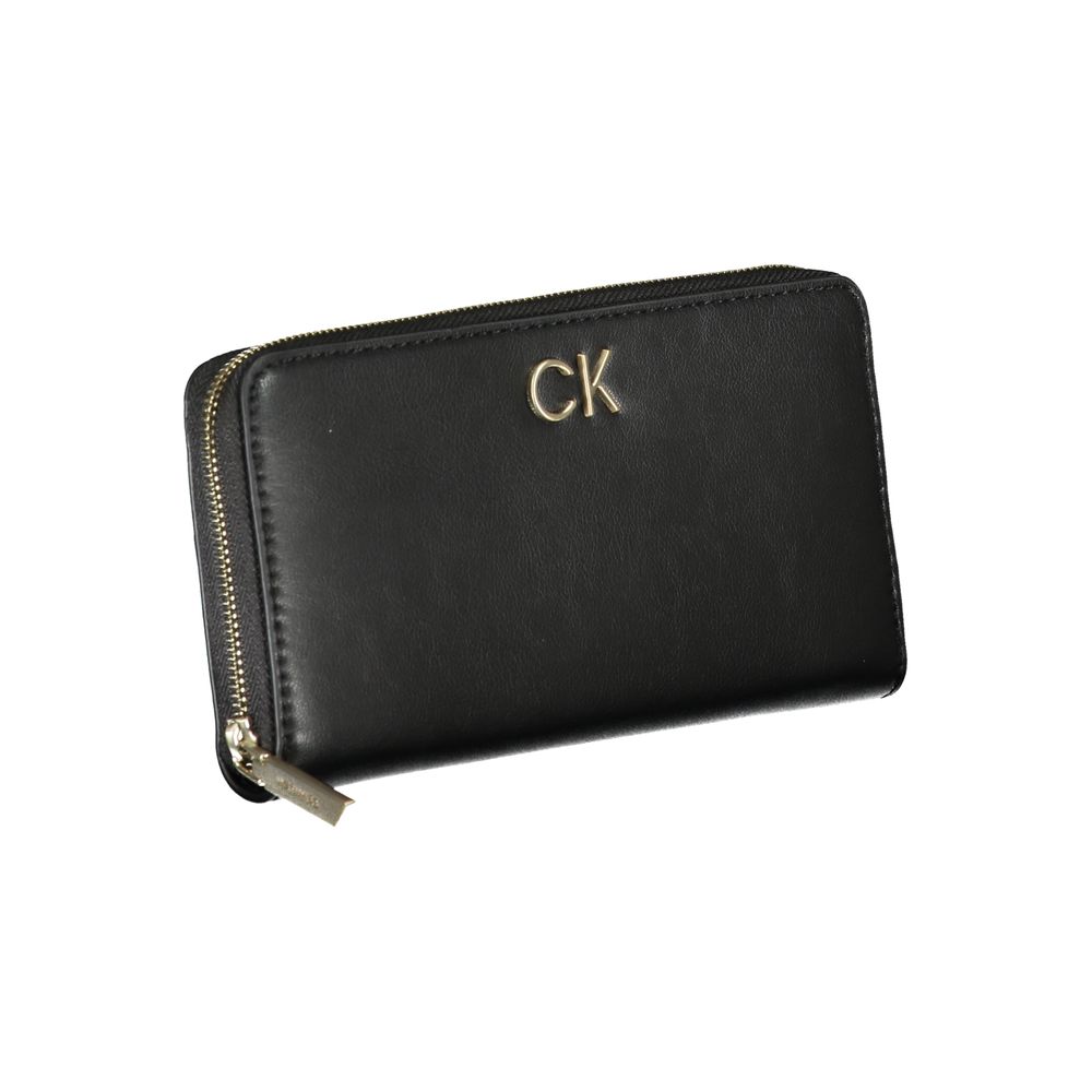 Elegant Multi-Compartment Designer WalletExperience the blend of functionality and sleek design with this sophisticated wallet from Calvin Klein. Designed for the modern individual, it offers five compartments, a convenient coin purse, and dedicated card