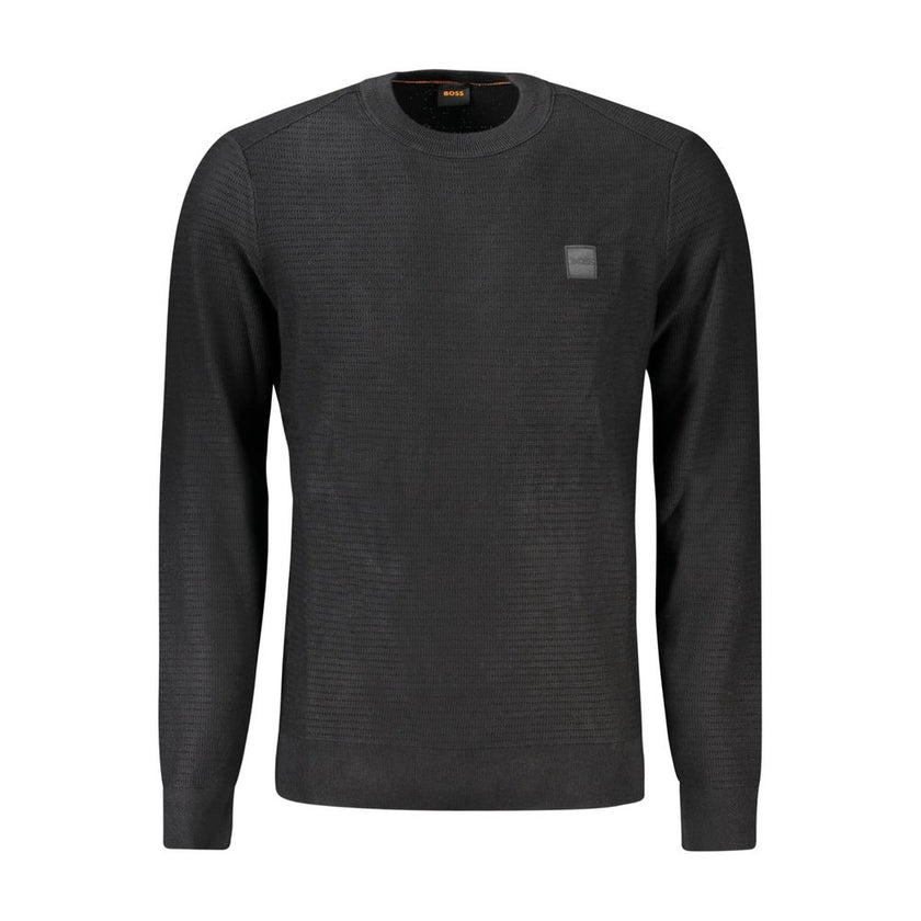 Black Cotton Men SweaterWrap yourself in the epitome of sleek elegance with this Hugo Boss long-sleeved sweater. Designed with a crew neck and eye-catching contrasting details, this piece is not just a garment—it’s a statement. The subtle application of t