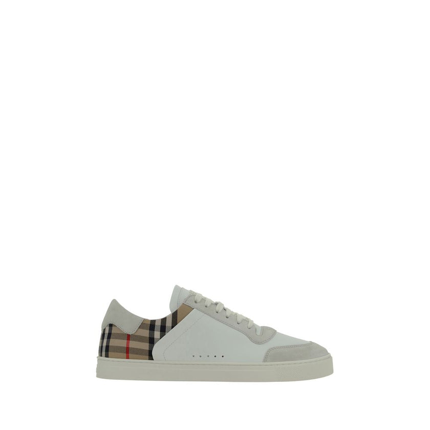 White Rubber Low Top SneakersCalfskin Stevie Sneakers by Burberry, featuring a panelled design, a lace-up fastening, a round toe, suede detailing, and the brand’s iconic Check Archive pattern on the back. Season: AW25 Composition: SOLE 100% Rubber UPPER 7