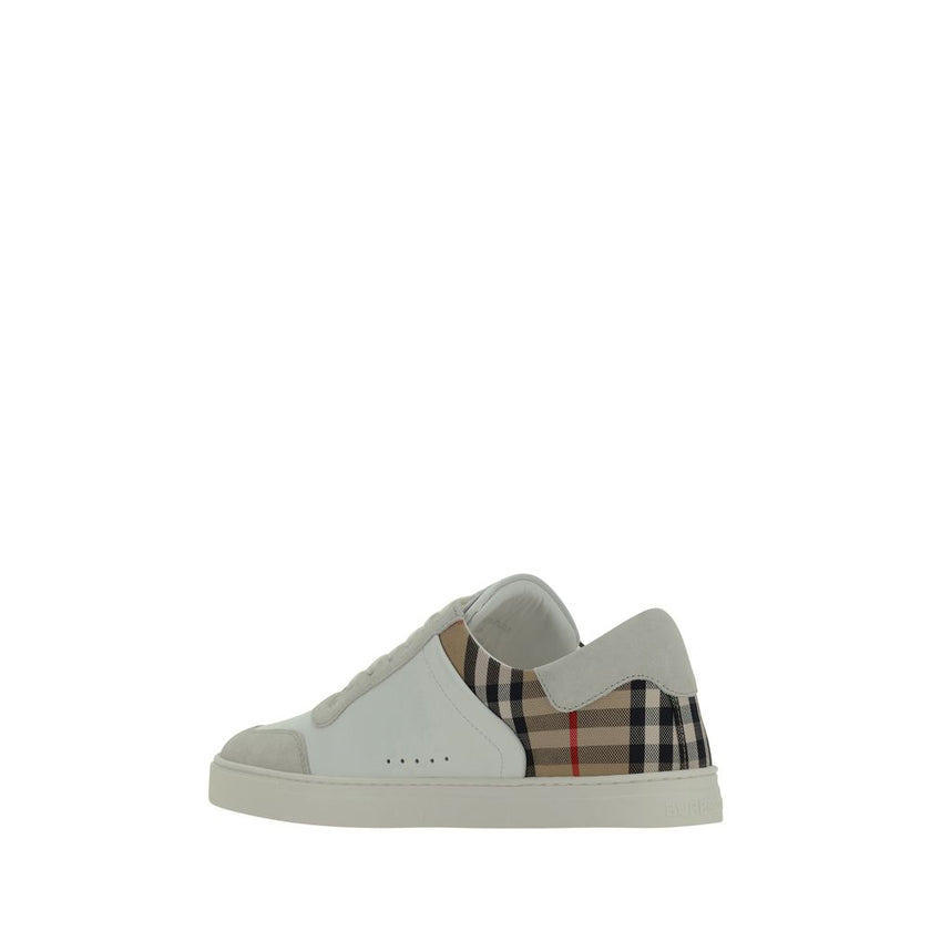 White Rubber Low Top SneakersCalfskin Stevie Sneakers by Burberry, featuring a panelled design, a lace-up fastening, a round toe, suede detailing, and the brand’s iconic Check Archive pattern on the back. Season: AW25 Composition: SOLE 100% Rubber UPPER 7