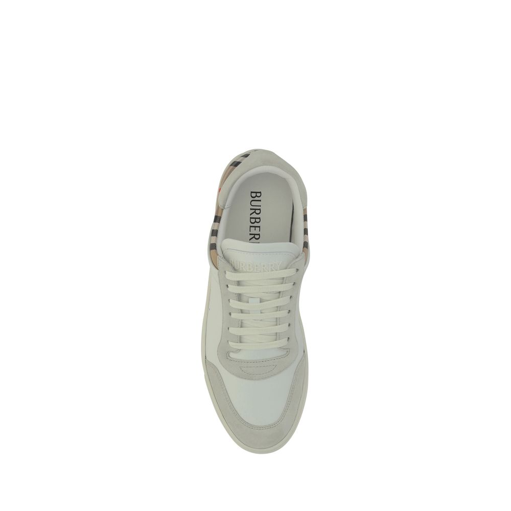 White Rubber Low Top SneakersCalfskin Stevie Sneakers by Burberry, featuring a panelled design, a lace-up fastening, a round toe, suede detailing, and the brand’s iconic Check Archive pattern on the back. Season: AW25 Composition: SOLE 100% Rubber UPPER 7