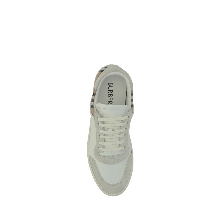 White Rubber Low Top SneakersCalfskin Stevie Sneakers by Burberry, featuring a panelled design, a lace-up fastening, a round toe, suede detailing, and the brand’s iconic Check Archive pattern on the back. Season: AW25 Composition: SOLE 100% Rubber UPPER 7