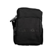 Black Nylon Men Shoulder BagElevate your accessory game with the sleek and stylish Calvin Klein shoulder bag. Crafted for the modern man, this bag melds functionality with eco-conscious fashion, featuring a durable blend of nylon, polyester, and polyethyl