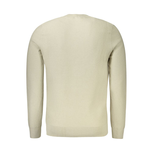 Beige Cotton Men SweaterElevate your wardrobe with the Hugo Boss sweater, a piece synonymous with effortless sophistication. This crew neck sweater, crafted with a luxurious blend of 95% cotton and 5% cashmere, ensures both comfort and style. Its long sle