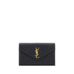 Black Calf Leather Bos Taurus Shoulder BagThe Monogram leather Shoulder Bag by Saint Laurent features a front snap-button closure for convenience and security. The leather design is enhanced by the matelassé print, which adds a sleek and sophisticated tex