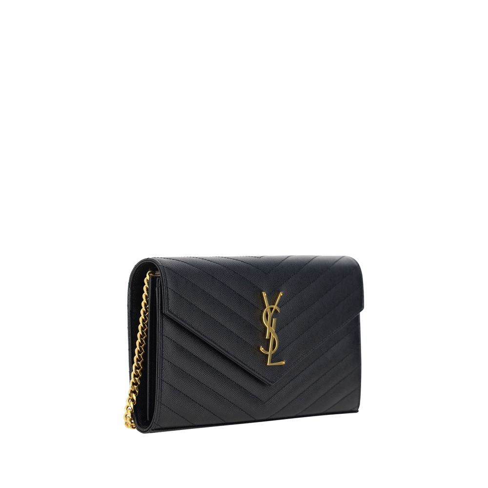 Black Calf Leather Bos Taurus Shoulder BagThe Monogram leather Shoulder Bag by Saint Laurent features a front snap-button closure for convenience and security. The leather design is enhanced by the matelassé print, which adds a sleek and sophisticated tex
